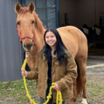 Grace Bakeman and light brown horse